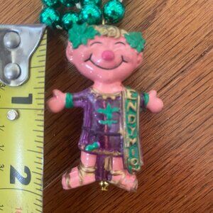 ENDYMION Purple MASCOT MAN MARDI GRAS NECKLACE BEAD CAESAR Krewe Parade